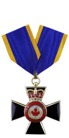 Commader of the Order of Military Merit medal showing the front face and the blue and gold ribbon.