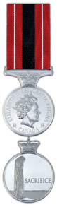Front and back face of the silver sacrifice medal, also shown is the red, white, and black ribbon.